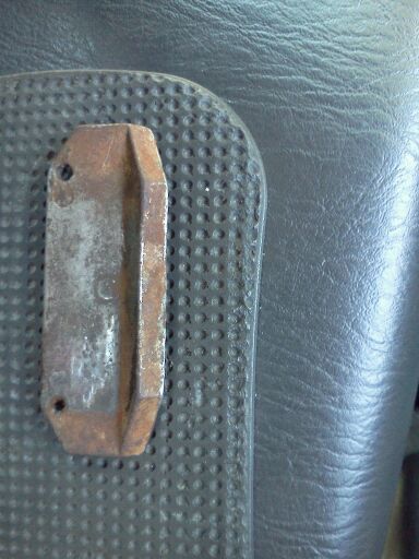 its bent at about a 30 degree angle and it about 3 inches long two of them per side to help lock in the caliper.