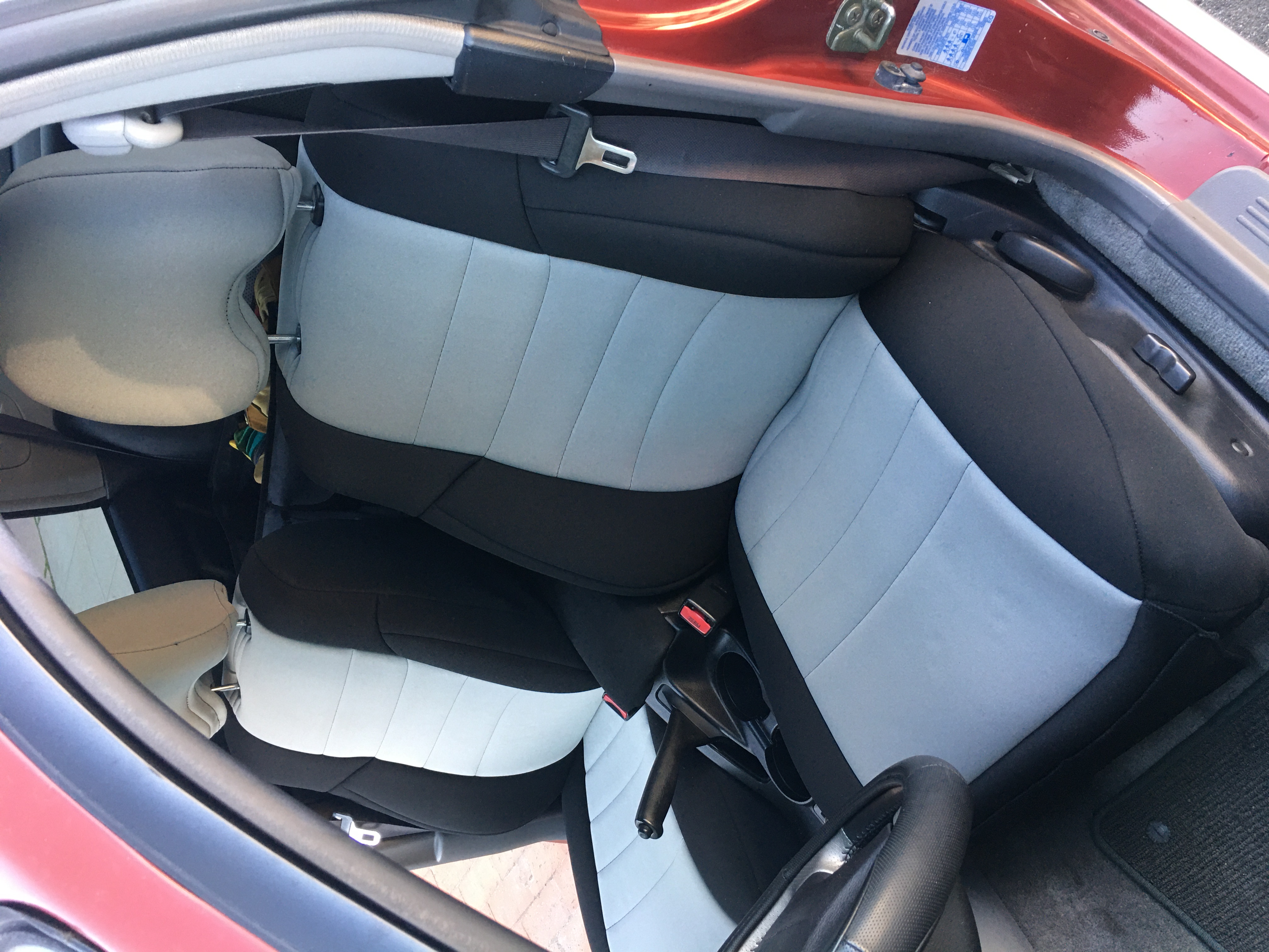 Drivers Seat - Wet Okole cover with seat cushion installed.JPG