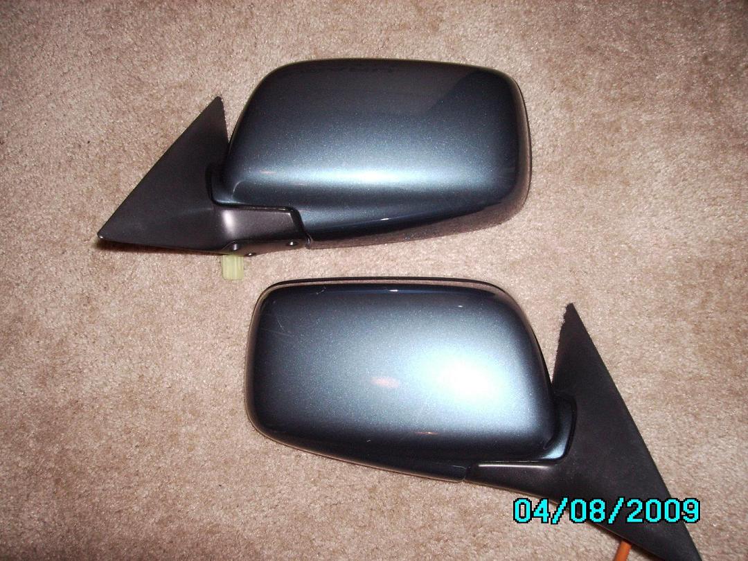 Left and right mirror hoods, excellent condition.